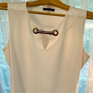 Tommy Hilfiger White with Blue and Red Accents.